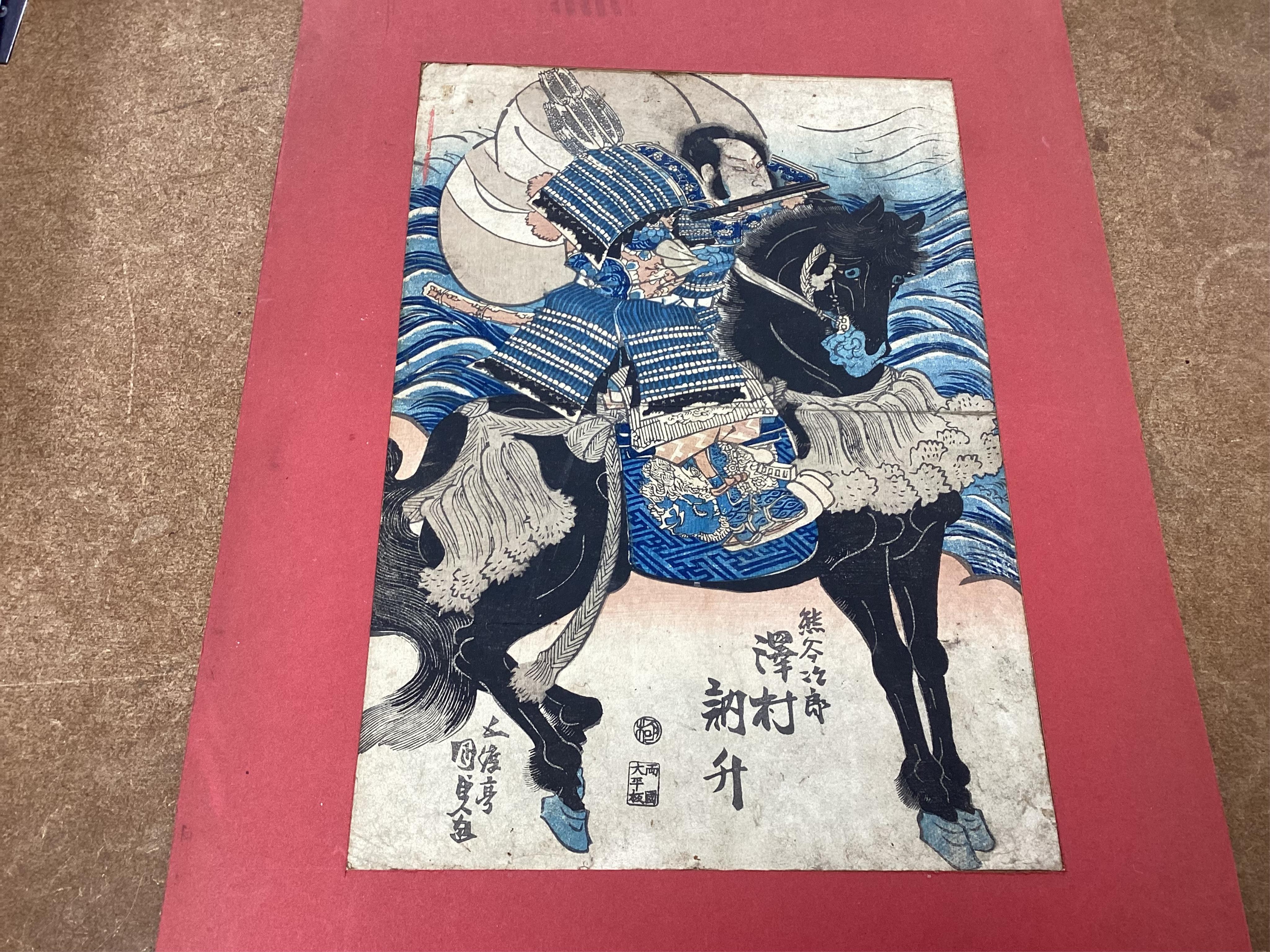 A collection of Japanese woodblock prints comprising Utagawa Kuniyoshi (1797-1861), After Utagawa Kuniyoshi, ‘Benkei on the Boat’ and another depicting a Samurai warrior on horseback, mounted, unframed, largest 35 x 24cm